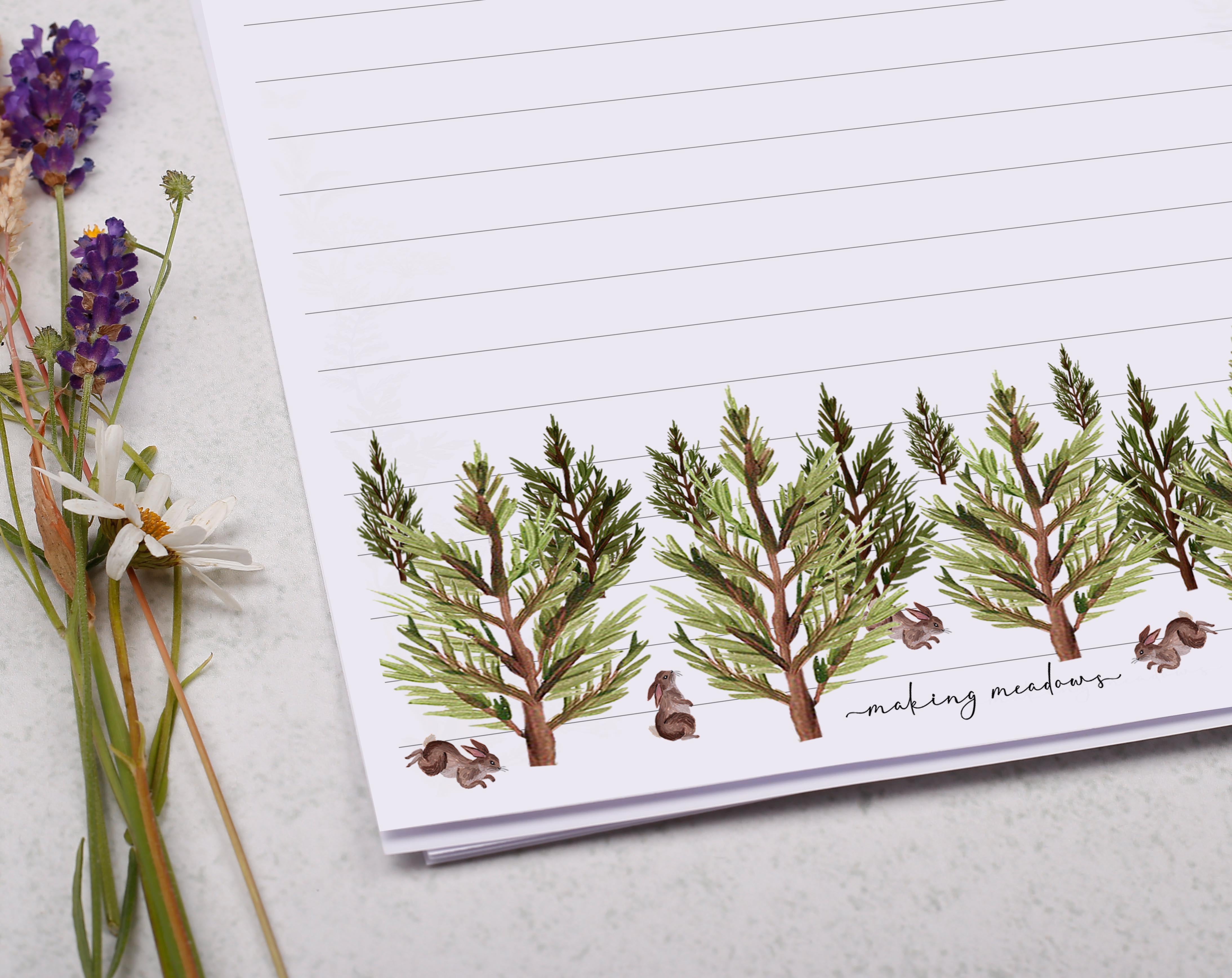 A5 writing paper with trees and rabbits. Stationery designed by Making Meadows