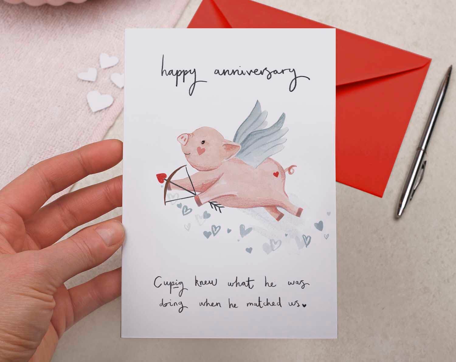 Cute Cupid Pig Anniversary Card. Greeting Cards designed by Making Meadows