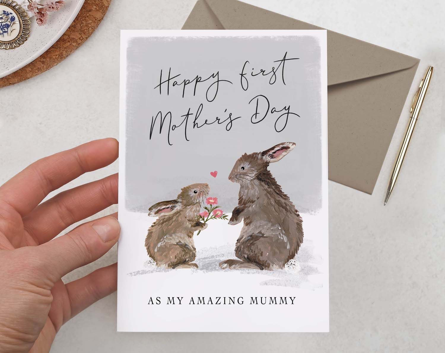 A sentimental rabbit First Mother's Day Card with a pair of adorable bunny rabbits. 