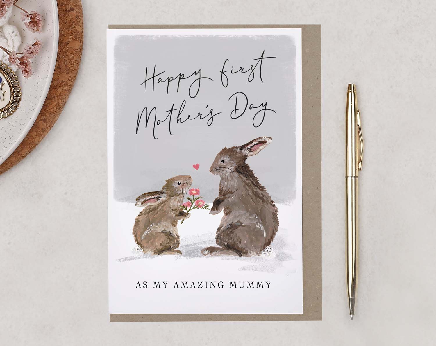 A sentimental rabbit First Mother's Day Card with a pair of adorable bunny rabbits. 
