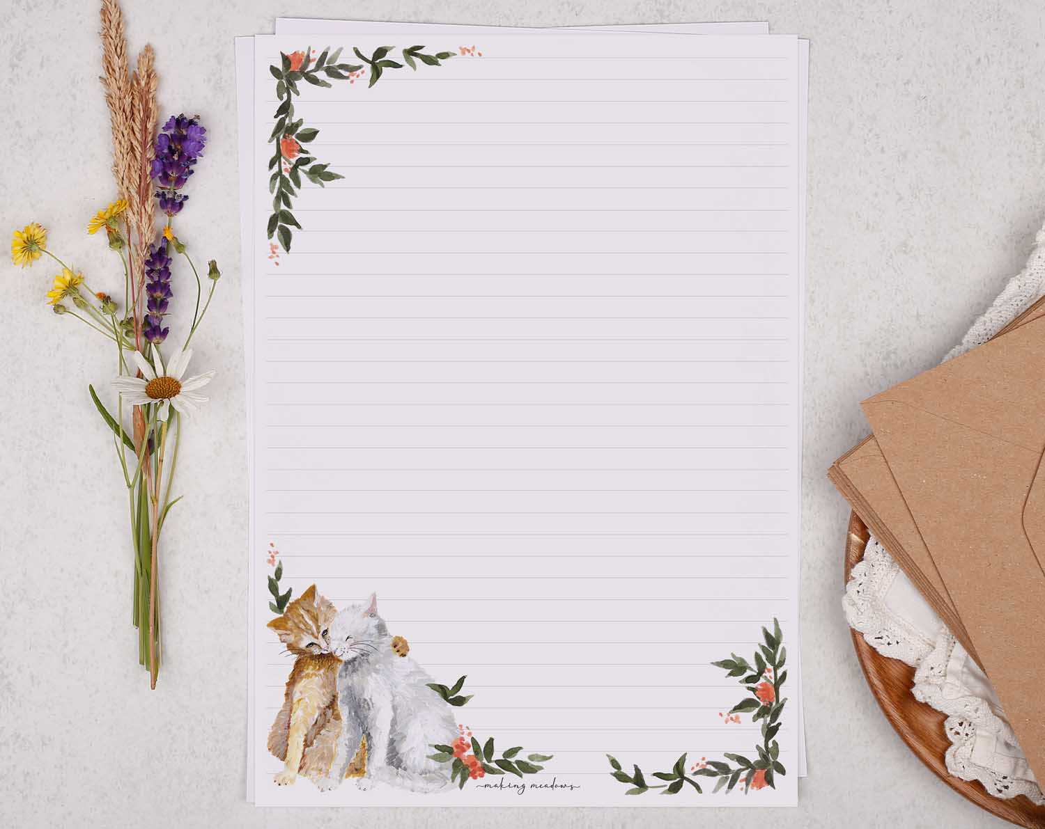 A4 letter writing paper sheets with a cute pair of hugging cats and a delicate pink floral watercolour border cascading around the letter paper edge.