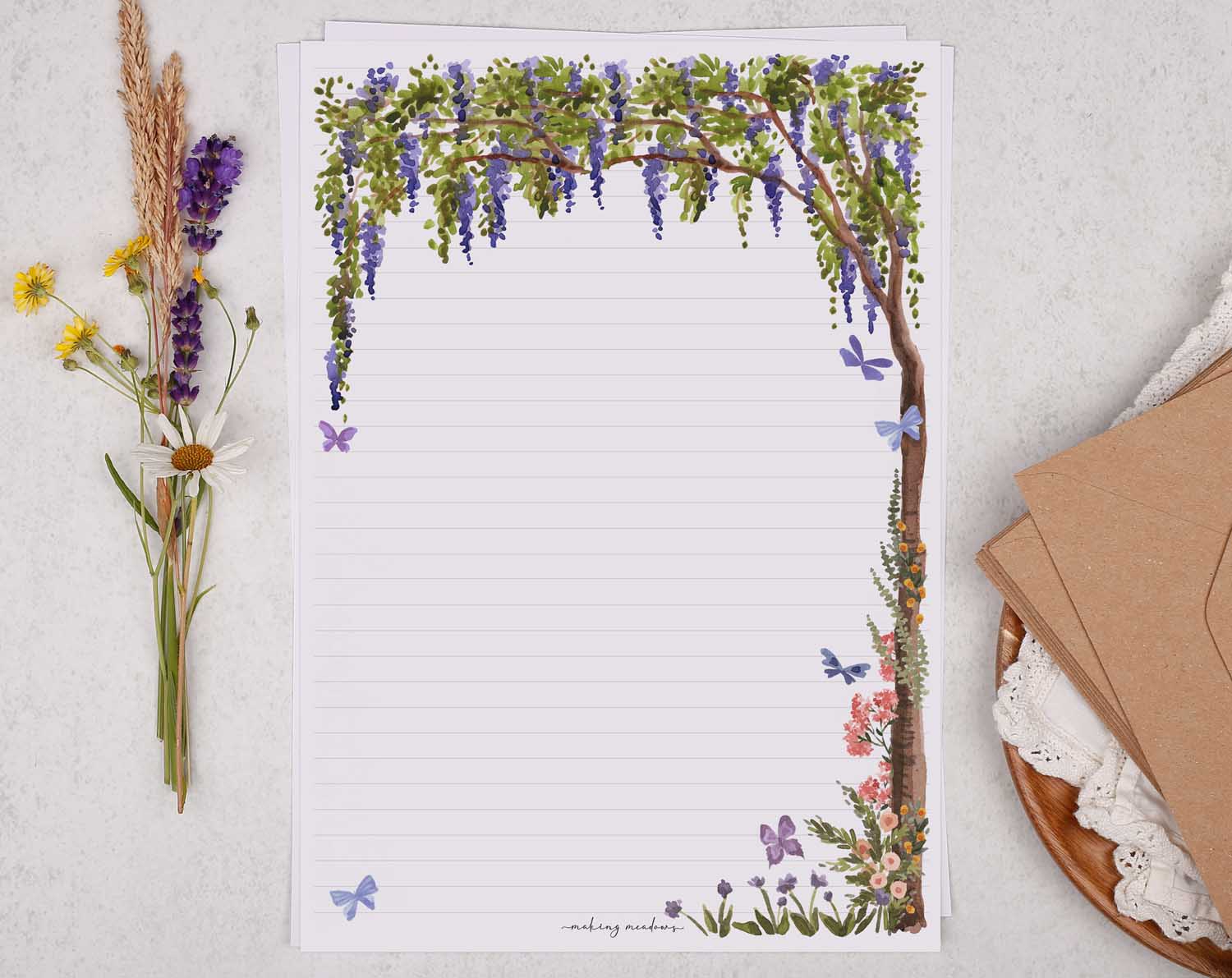 A4 letter writing paper sheets with a wisteria flower border around the letter paper in a delicate floral pattern. 