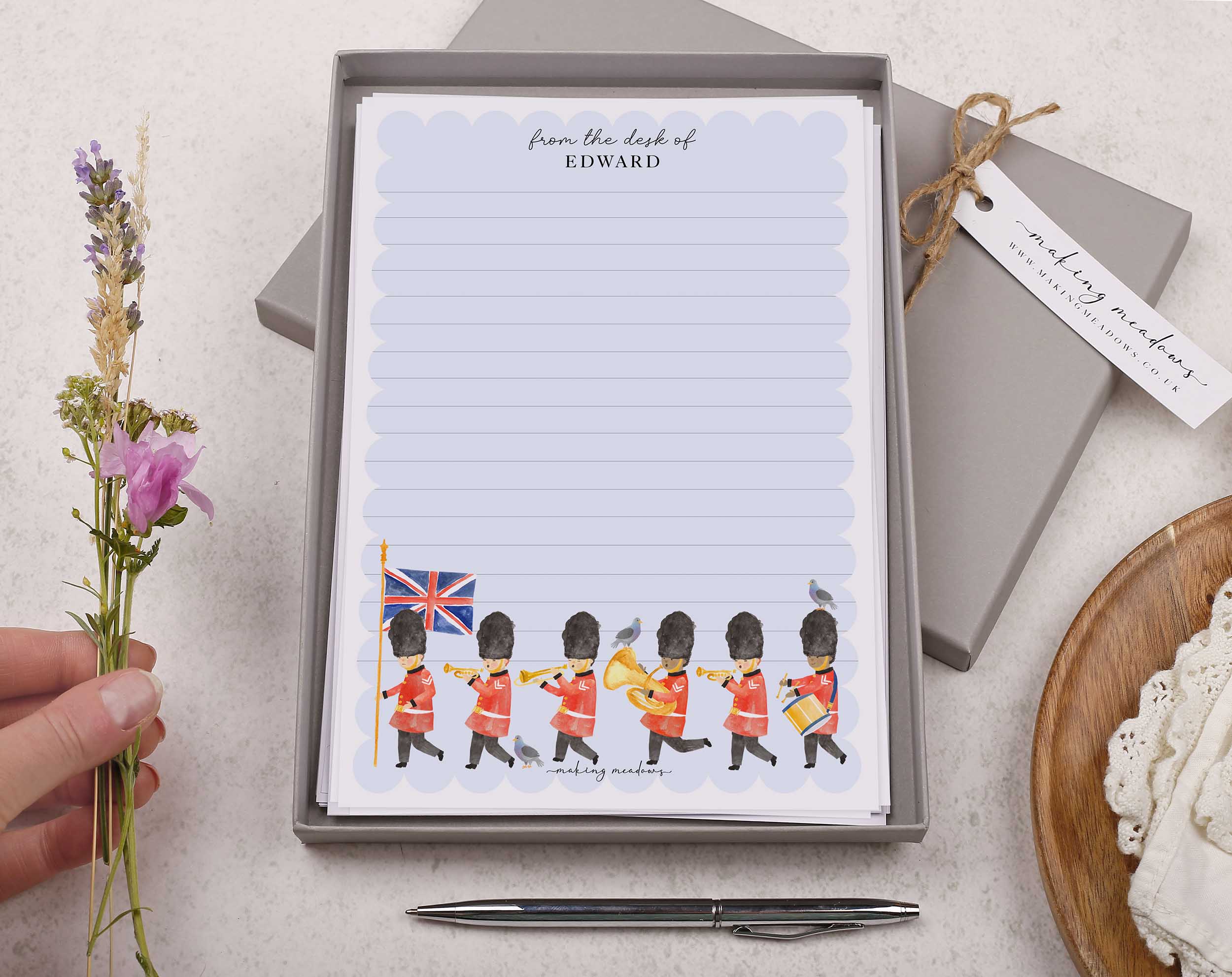 Premium personalised A5 letter writing paper set for children with the Queens guards marching along.