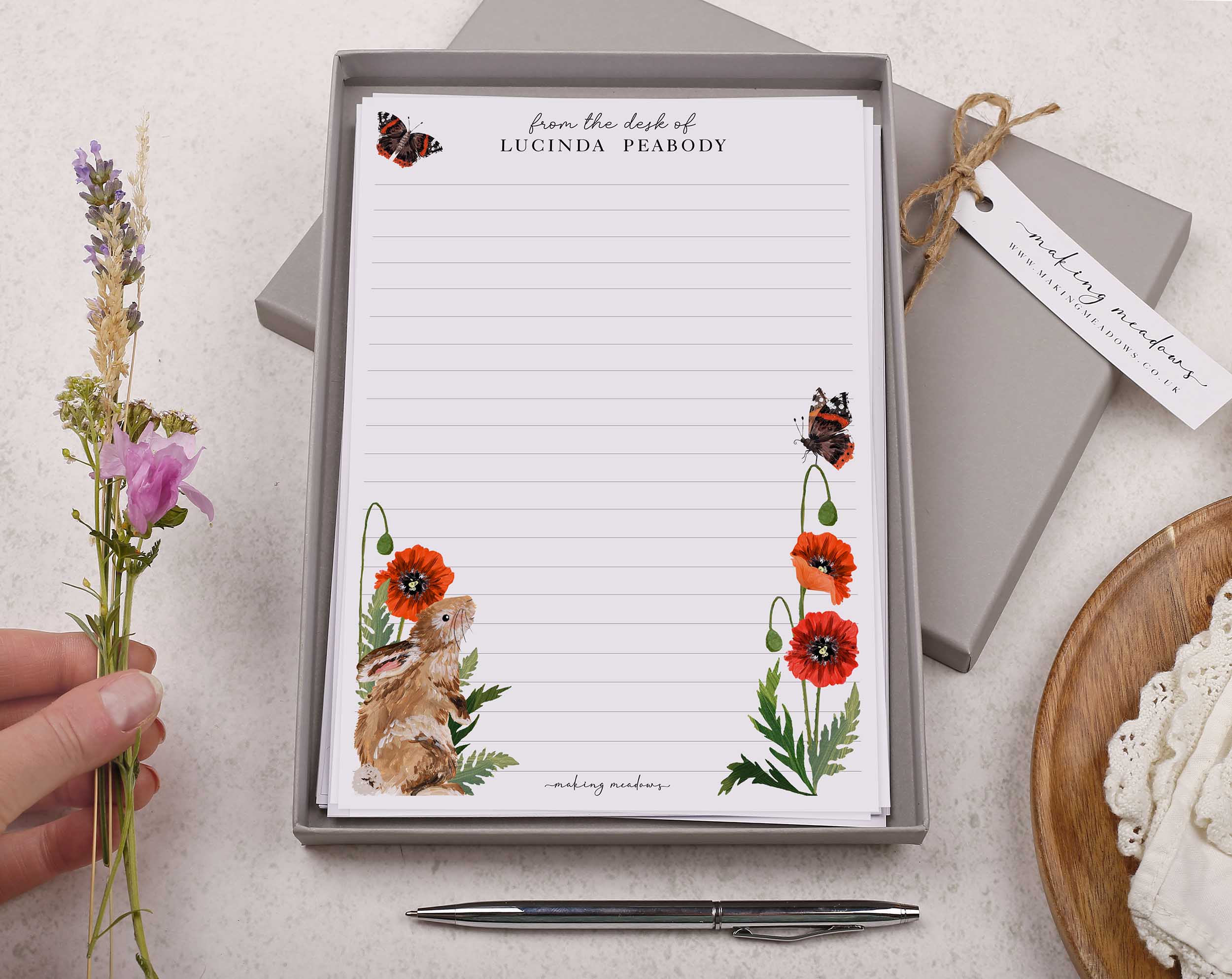 Premium personalised A5 letter writing paper set with a beautiful rabbit and poppy illustration scattered around the border of the letter paper sheets.