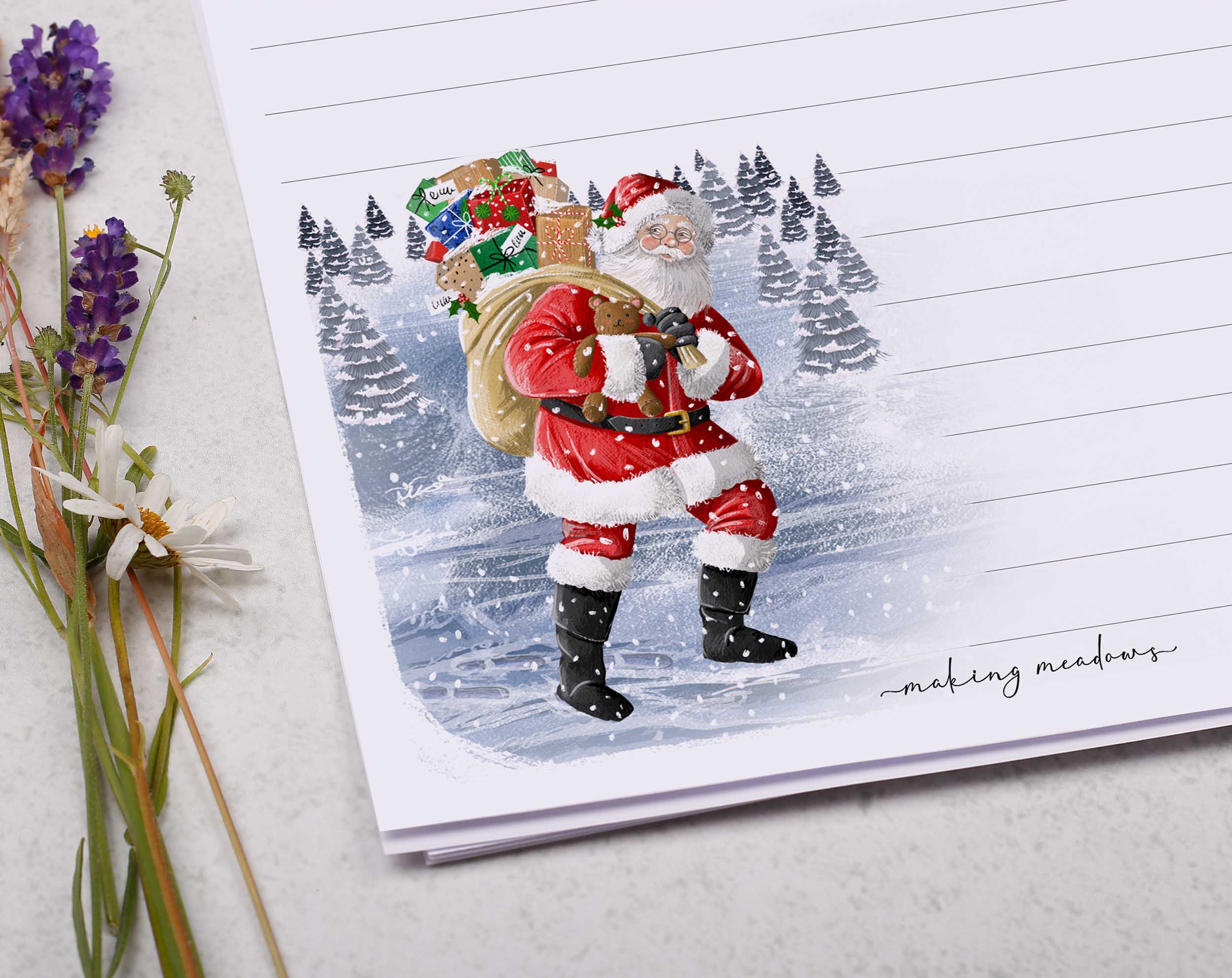 Premium personalised A5 letter writing paper set with Father Christmas plodding through the snow, delivering his presents.