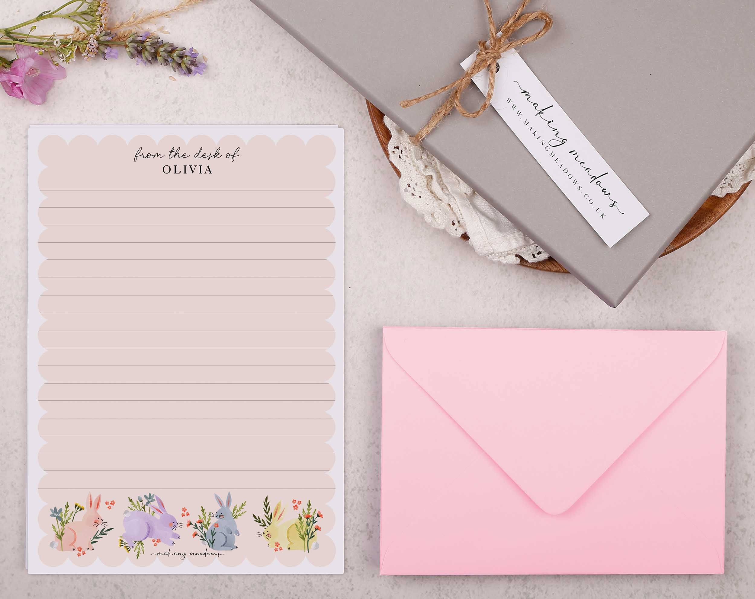 Premium personalised A5 letter writing paper set with bunny rabbits jumping through flowers and a super cute pink scalloped edge borderPremium personalised A5 letter writing paper set with bunny rabbits jumping through flowers and a super cute pink scalloped edge border