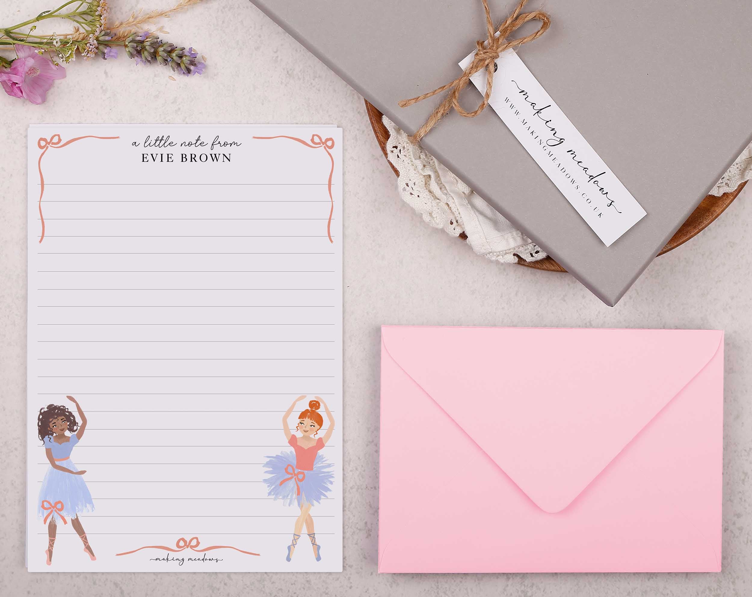 Premium personalised A5 letter writing paper set with ballet dancers dancing and ribbons curling around the edge.