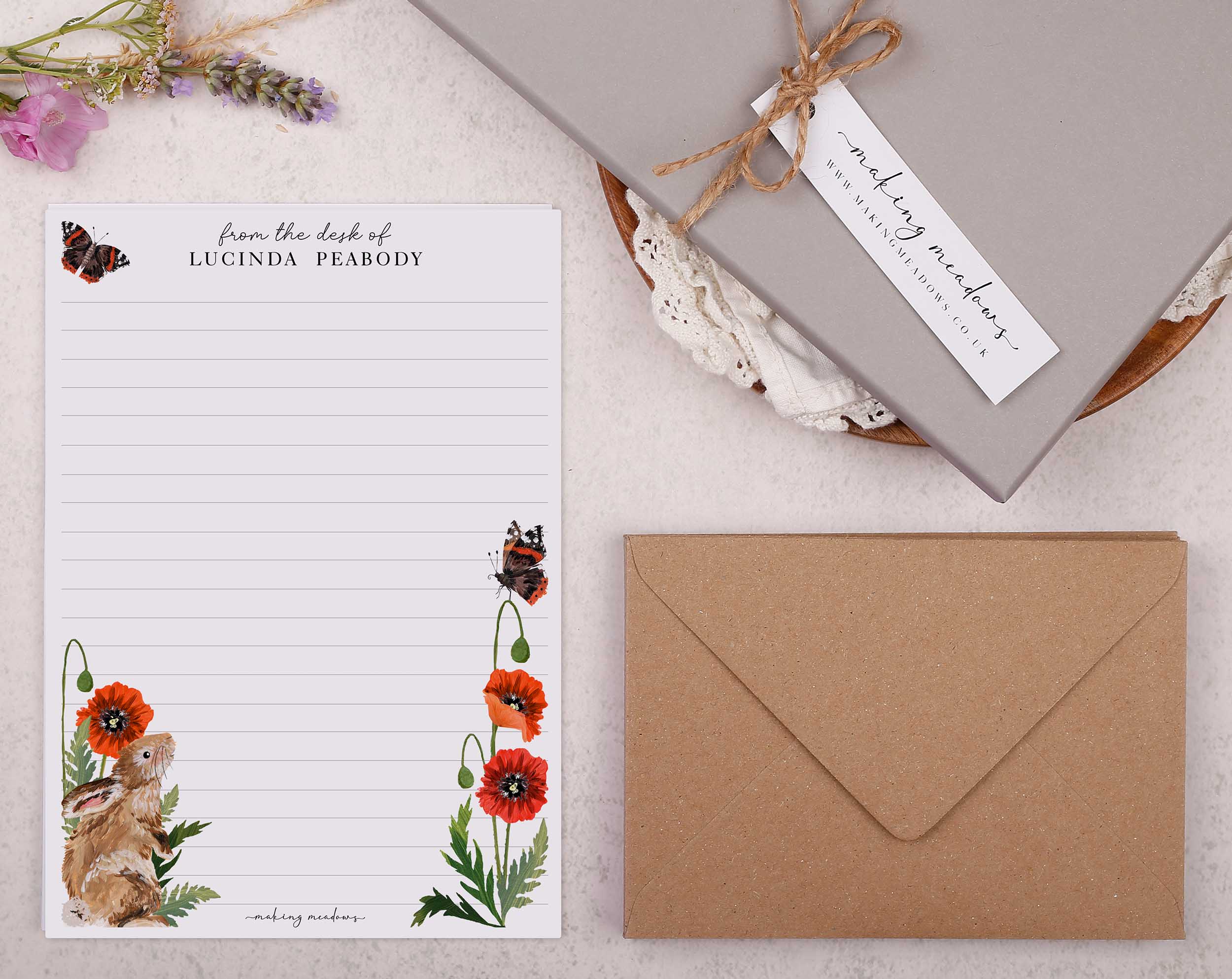 Premium personalised A5 letter writing paper set with a beautiful rabbit and poppy illustration scattered around the border of the letter paper sheets.
