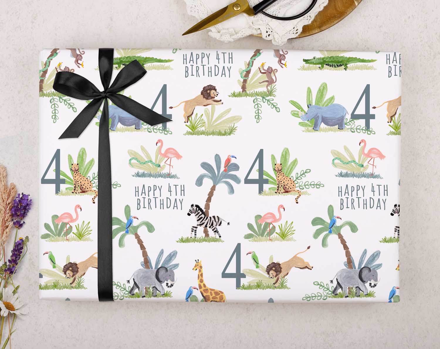 Safari Animal 4th Birthday Wrapping Paper. Wrapping Paper designed by Making Meadows