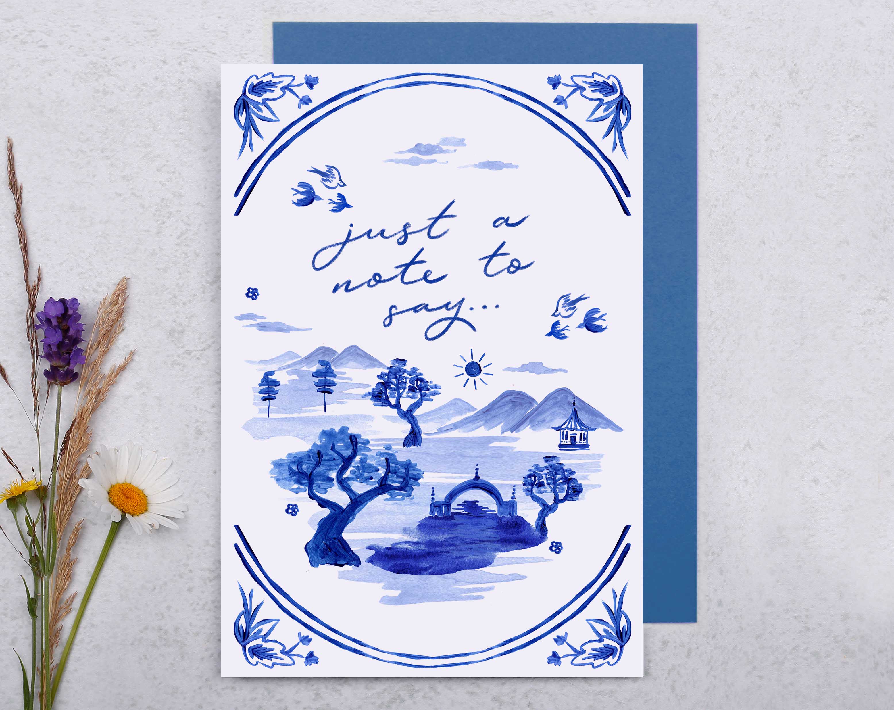 A blue porcelain inspired Just A Note To Say Card with a beautiful hand painted oriental landscape.
