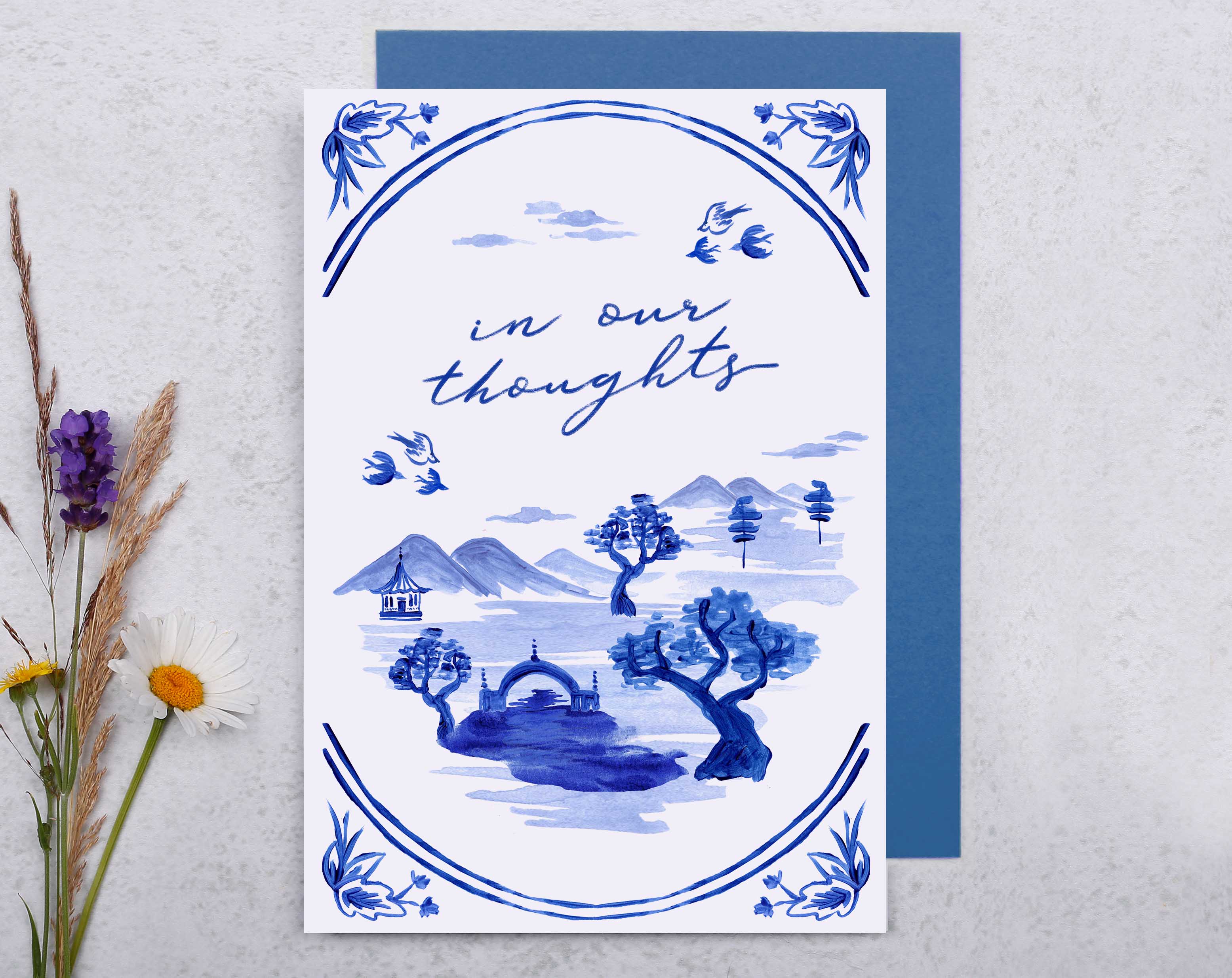 A blue porcelain inspired In Our Thoughts Sympathy Card with hand painted blue oriental landscape.