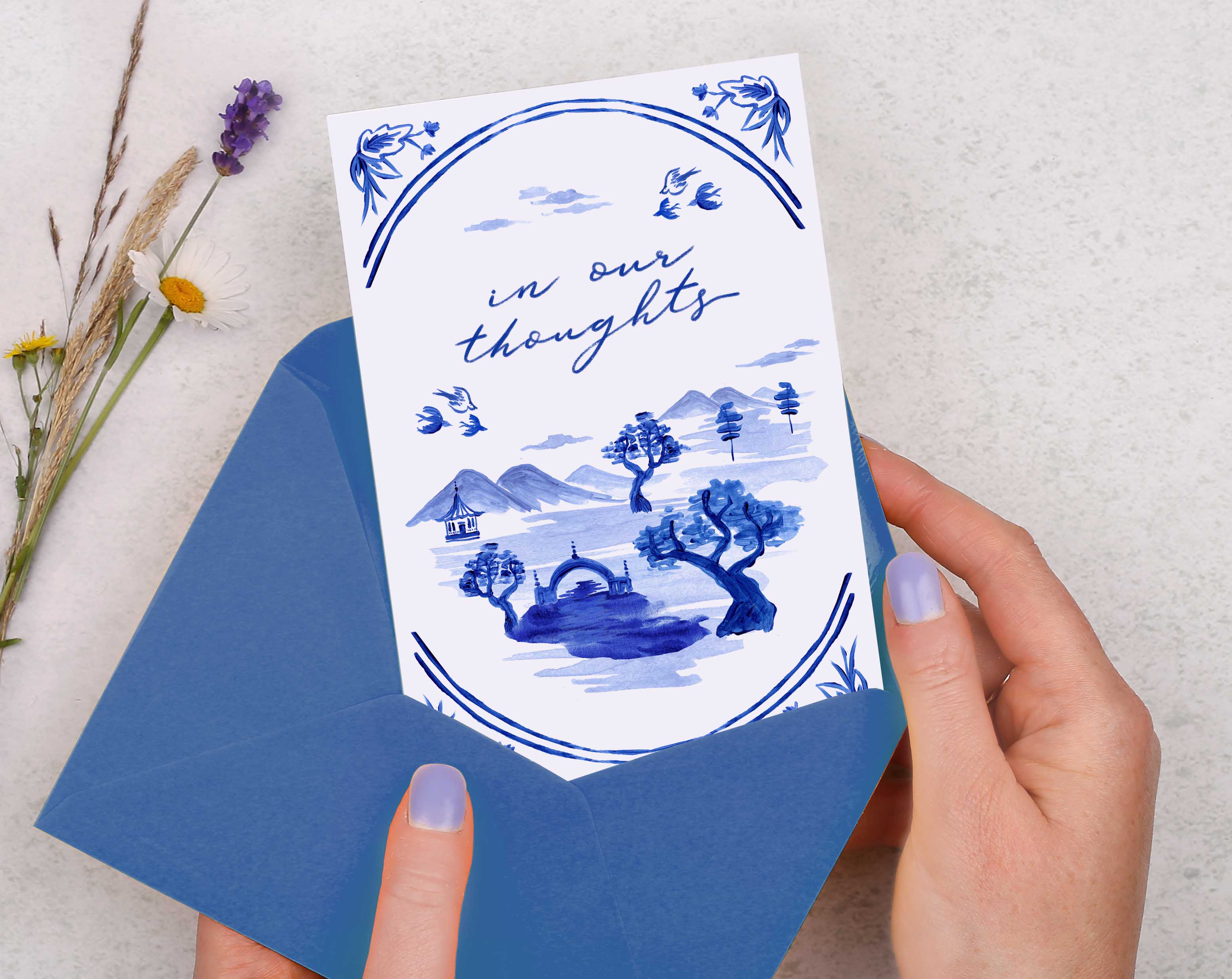 A blue porcelain inspired In Our Thoughts Sympathy Card with hand painted blue oriental landscape.