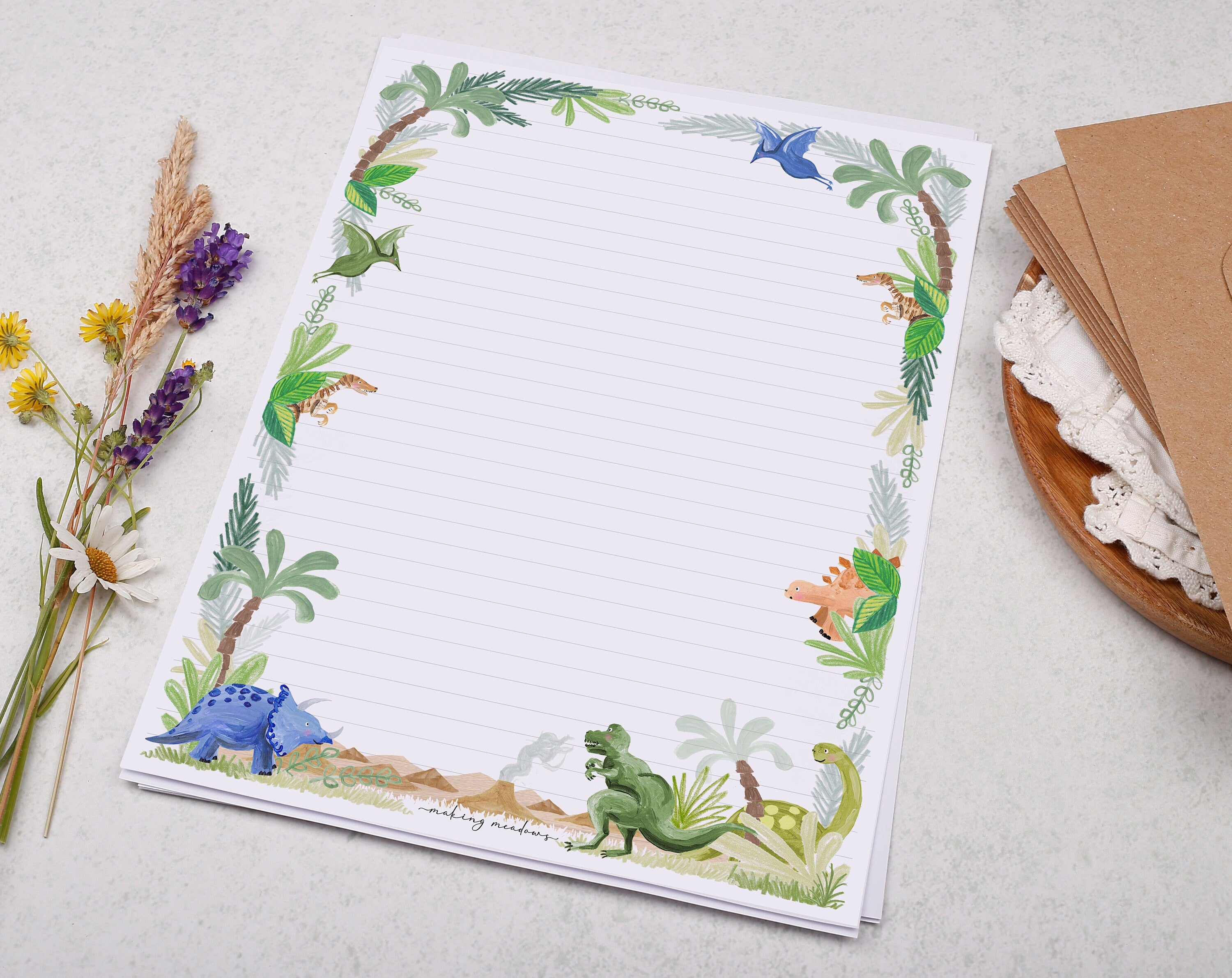 A4 writing paper with dinosaur jungle